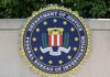 FBI seal featuring stars and laurel leaves