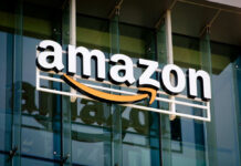 Amazon Slams Brakes On THIS After Deadly Horror Amazon logo on a glass office building