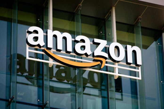 shutterstock_2507295771 Amazon logo on a glass office building