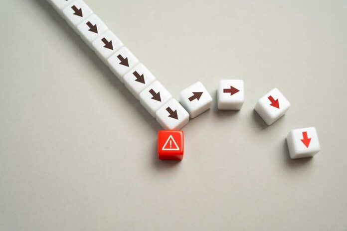 Consequences,Of,A,Collision,With,A,Problem.,Collapse,And,Failure. A red warning block surrounded by white blocks with directional arrows