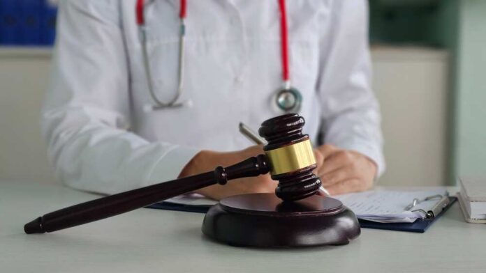 Doctor,With,A,Judge,Gavel,In,A,Clinic.,Forensic,Medical