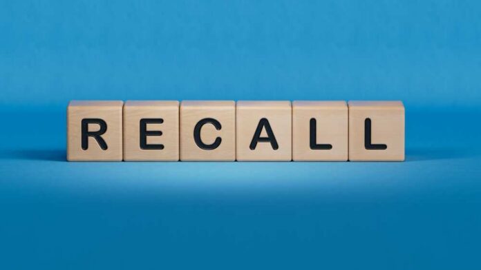 Recall,Written,On,Cubes,On,Wooden,Background.close,Up,Of,Wooden Wooden blocks spelling recall on a blue background