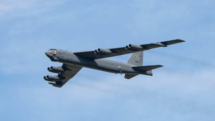 Zeltweg,,Styria,,Austria,-,09,03,2022:,A,B-52,Stratofortress B-52 bomber flying against a blue sky