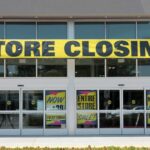 25 Stores Gone — Now What? Storefront with a large 'STORE CLOSING!' banner and sale signs