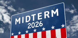 Election sign reading Midterm 2026 against a cloudy sky