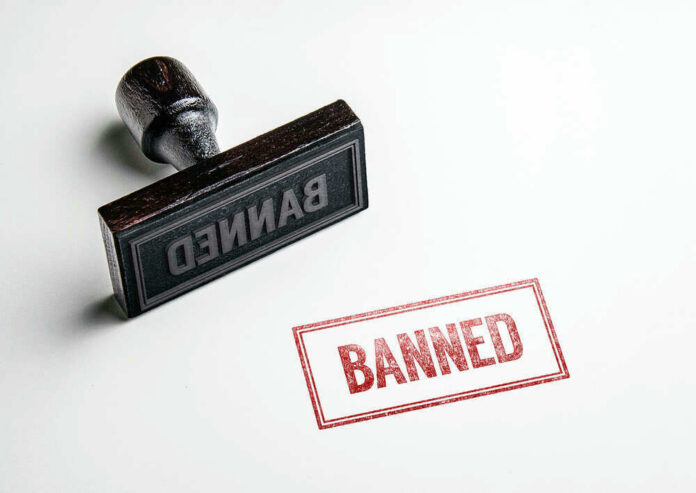 shutterstock_423625090 Banned rubber stamp and stamped text on paper