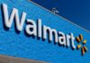 Holiday Shock: Walmart Rolls Two Into One Walmart store sign on a blue wall