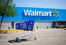 ATTENTION: Walmart Aisles In Danger? Shopping cart in a Walmart parking lot.