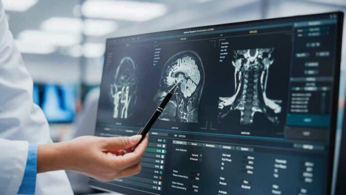 shutterstock_2140344447-2 Doctor pointing at brain scans on a computer screen.