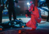 Subway Murder Sparks Patrol Surge Forensic investigator examines crime scene at night.