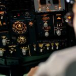 Aircraft cockpit overhead panel with illuminated switches and gauges