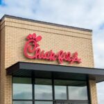 Chick-fil-A BANS Drive-Thru Bots Chick-fil-A restaurant sign on a brick building