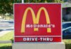 Pump Food Crushes McDonald’s Prices McDonald's drive-thru sign with iconic golden arches