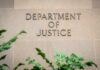 DOJ Blitz Nails Illegal Ballots Department of Justice building wall with engraved lettering