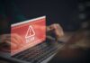 Creepy Marketplace Twist Targets Phone Numbers Warning message about a scam displayed on a laptop screen