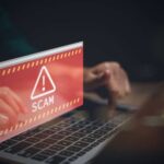 Creepy Marketplace Twist Targets Phone Numbers Warning message about a scam displayed on a laptop screen