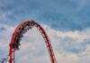 Horror Ride – Nationwide Coasters Halted Red roller coaster loop against a cloudy sky