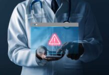 Doctor with smartphone showing digital warning icon